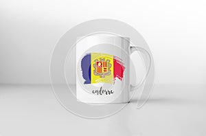 Andorra flag on white coffee mug.