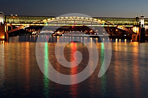 Andreyevsky (Pushkinsky) Bridge (left side) across Moskva River, located between Luzhniki and Gorky Park in Moscow, Russia