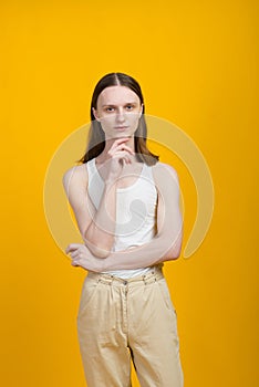 Androgynous beautiful young man. Model tests in studio