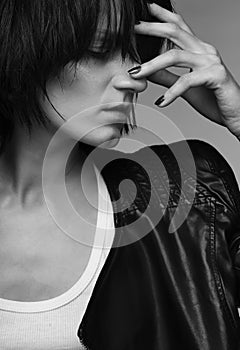 Androgyny female model in Heroin chic style.