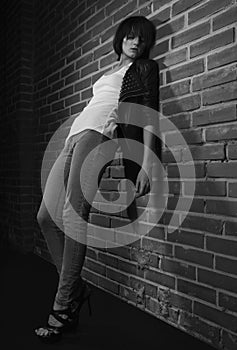 Androgyny female model in Heroin chic style. photo