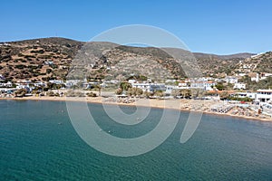 Andros island Batsi village Cyclades Greece. Aerial drone view of sandy beach, sea water blue sky