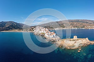 Andros Island, Greece. Traditional buildings on cape. Chora town aerial view