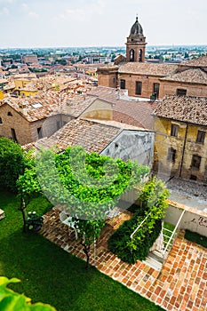 Andscape with roofs of houses in small tuscan town in province