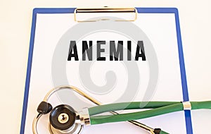 ANEMIA- text on medical folder with documents and stethoscope on white background