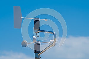 Anemometer, blue sky as background photo