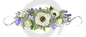 Anemones and blue agapanthus flowers in a floral arrangement isolated