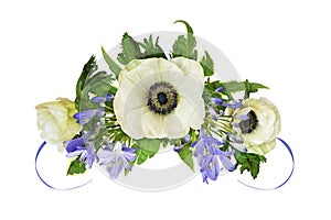 Anemones and blue agapanthus flowers in a floral arrangement isolated