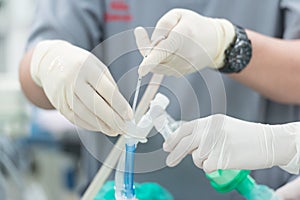 anesthesia nurse use suction suck sputum in double lumen endotracheal tube photo