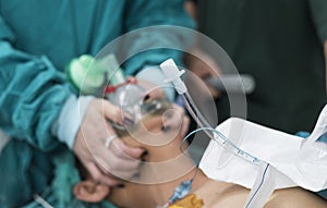 anesthesiologist doctor hold oxygen mask and prepare for intubation