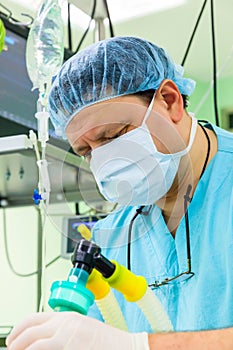 Anesthesiologist in operation room photo
