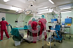 Anesthetic team preparing little patient photo