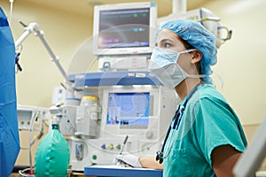 Anesthetist Working In Operating Theatre