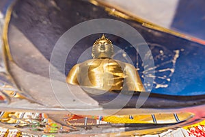 Ang Thong, Thailand-June, 19, 2021 : Reflection in the water of The Big Great Buddha of Thailand is one of the main pilgrim.