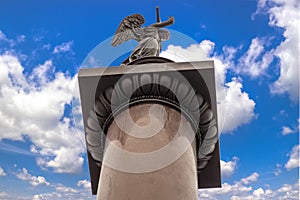 Angel Alexander column background blue sky in white clouds clo