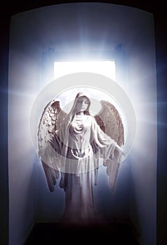 Angel archangel standing in mystic gate with divine rays of light like spiritual and religious concept