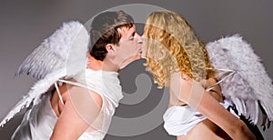 Angel couple kissing
