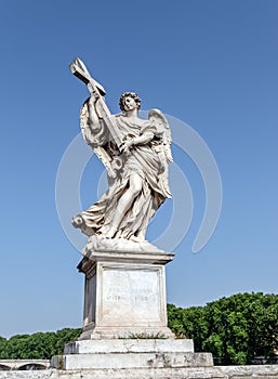 Angel with the Cross at the Sant`Angelo bridge - Rome, Italy