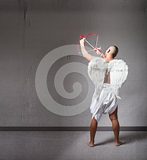 Angel cupid ready for valentine's day photo