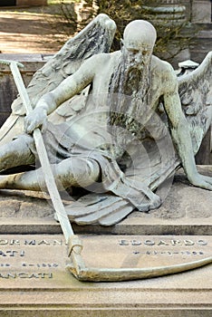 Angel of death sculpture at Monumental Cemetery, Milan