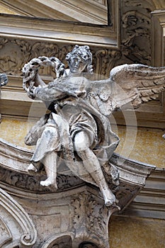 Angel on facade of Santa Maria Maddalena Church in Rome