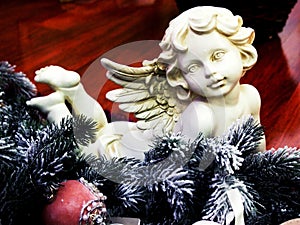 Angel figurine on Christmas tree branch