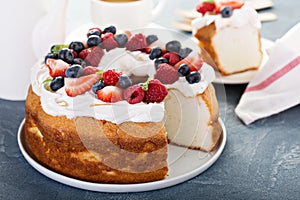 Angel food cake with cream and berries