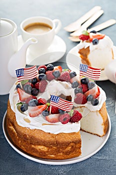 Angel food cake with whipped cream and berries