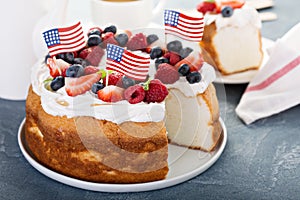 Angel food cake with whipped cream and berries