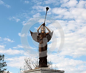 Angel Gabriel Preparing to Blow Her Horn