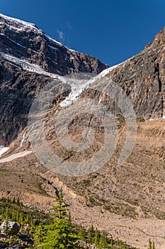 Angel Glacier hangs over a cliff below Mount Edith Cavell