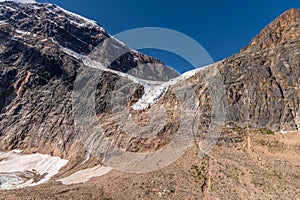 Angel Glacier hangs over a cliff below Mount Edith Cavell