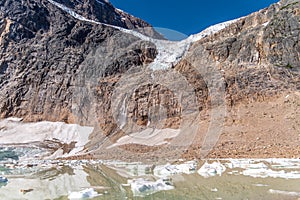 Angel Glacier hangs over a cliff below Mount Edith Cavell