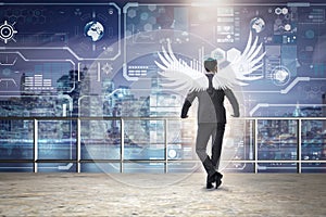 The angel investor concept with businessman with wings