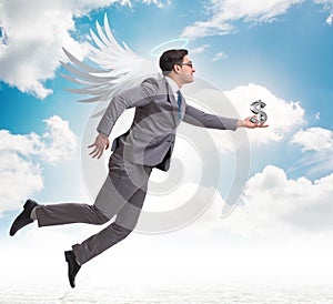 Angel investor concept with businessman with wings photo