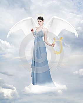 Angel with lyre on the cloud