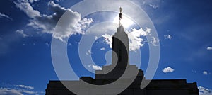 Angel Moroni on Top of Mormon LDS Temple with Sky and Clouds photo