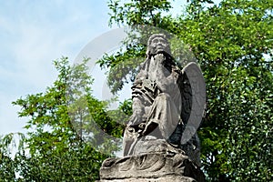 Angel in a park in Kamianets-Podilskyi, Ukraine.