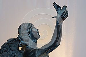 Angel releasing dove