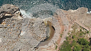 Angel`s Billabong beach, the natural pool on the island of Nusa Penida. Aerial view. Bali, Indonesia.