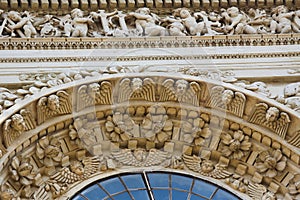 Angel sculptures at the Santa Croce baroque church in Lecce photo