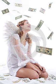 Angel sitting, money raining