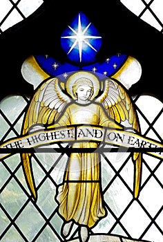 An angel with the star of Bethlehem in stained glass