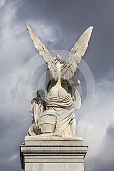 Angel statue from behind showing backside
