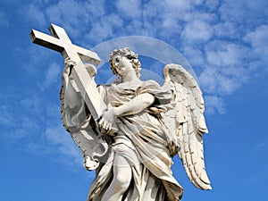 Angel Statue with cross.