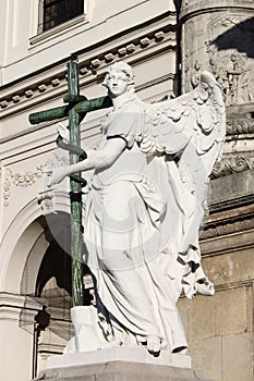 Angel statue with cross