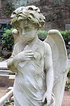 Angel statue with cross