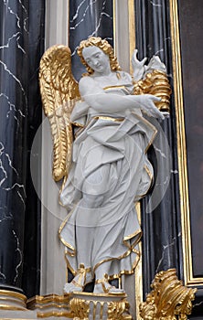 Angel statue on the The Deanâ€™s Altar in Wurzburg Cathedral