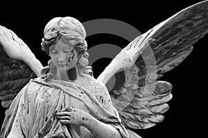 Angel statue on graveyard photo