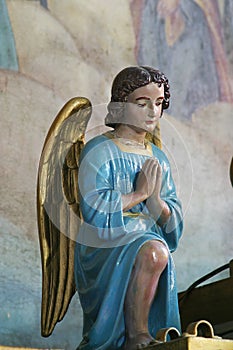 Angel statue on the main altar in All Saints Church in Bedenica, Croatia